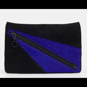 Giuseppe Zanotti rhinestone and suede clutch.